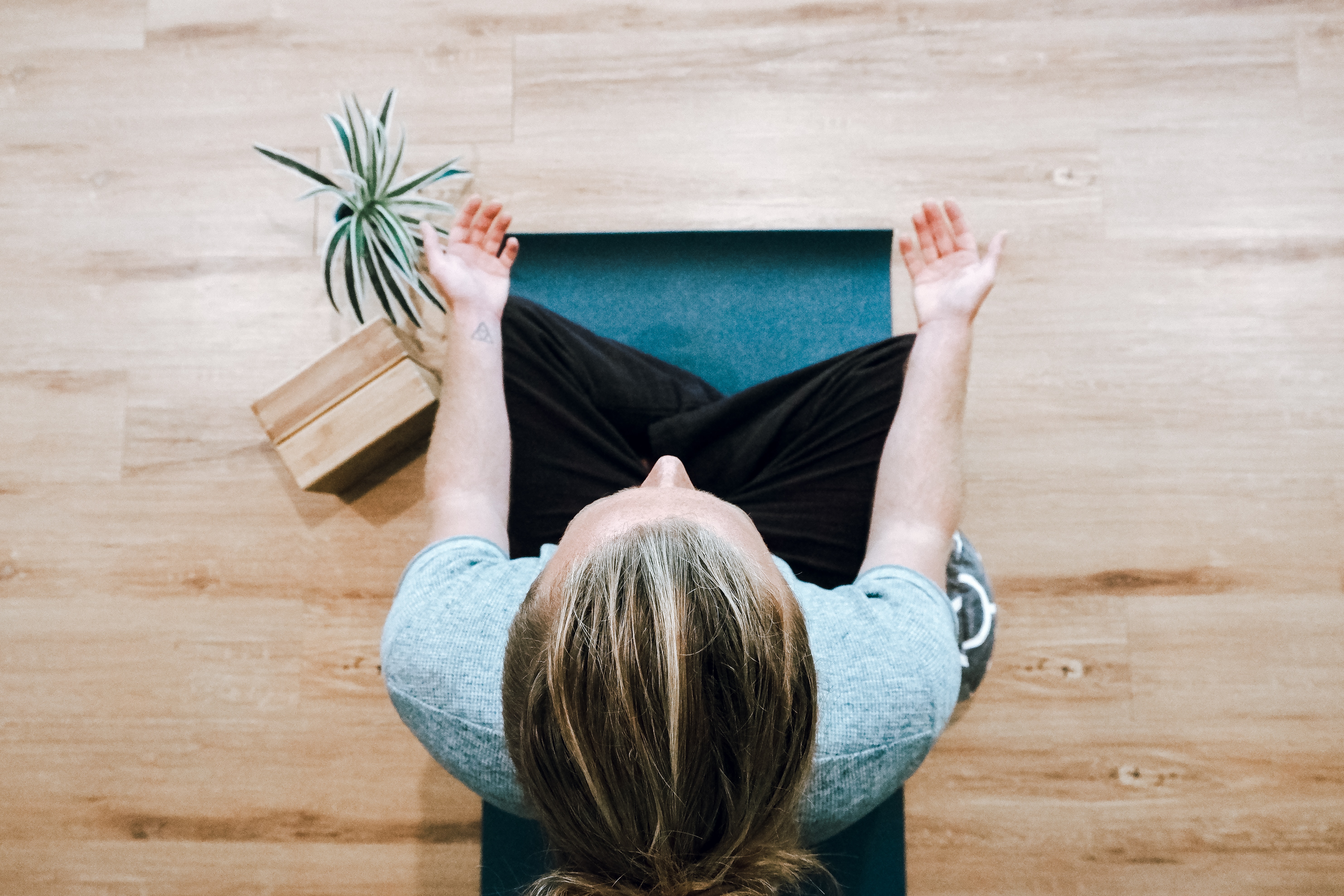 person seated doing meditation