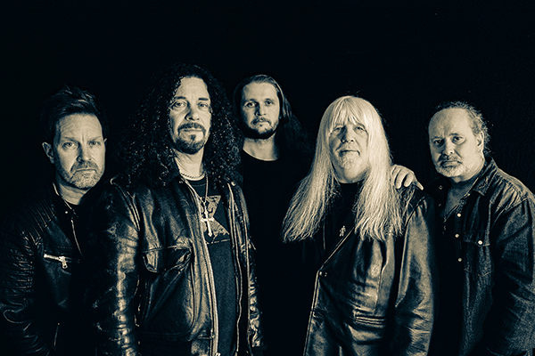 Five men wearing leather jackets, black & white image