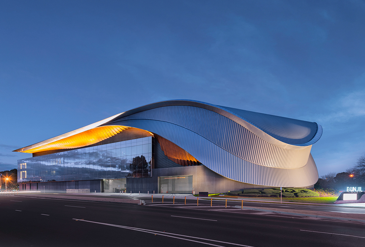 A large building with a curved roof
