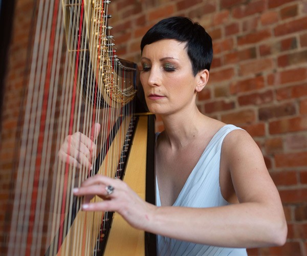 Emily Rosner Playing Harp