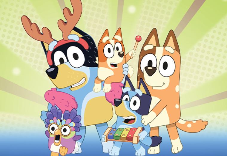 Four cartoon dogs from the television show Bluey.