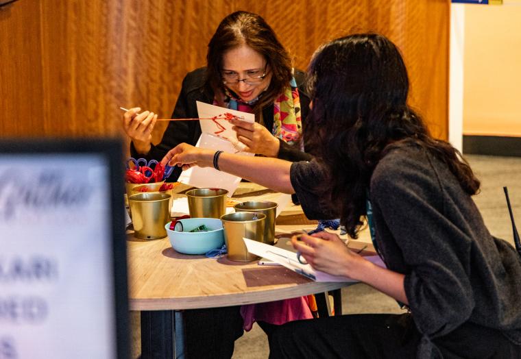 person doing embroidery