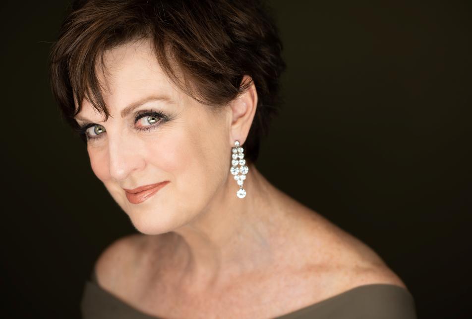 Music Theatre star Anne Wood smiles at the camera.