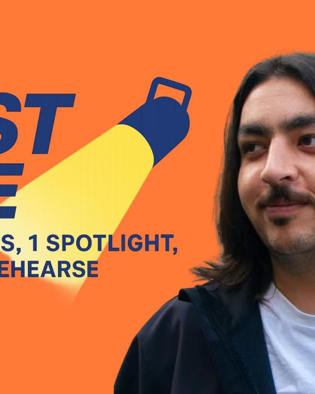 A man with long dark hair and a white tshirt under a black jacket, with the words Fast Five beside his head