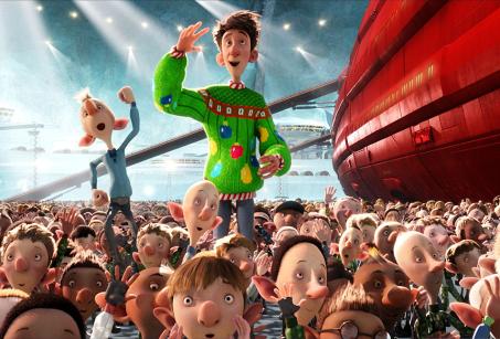 A cartoon character in a green suit stands above a seat of other characters. A scene from Arthur Christmas movie