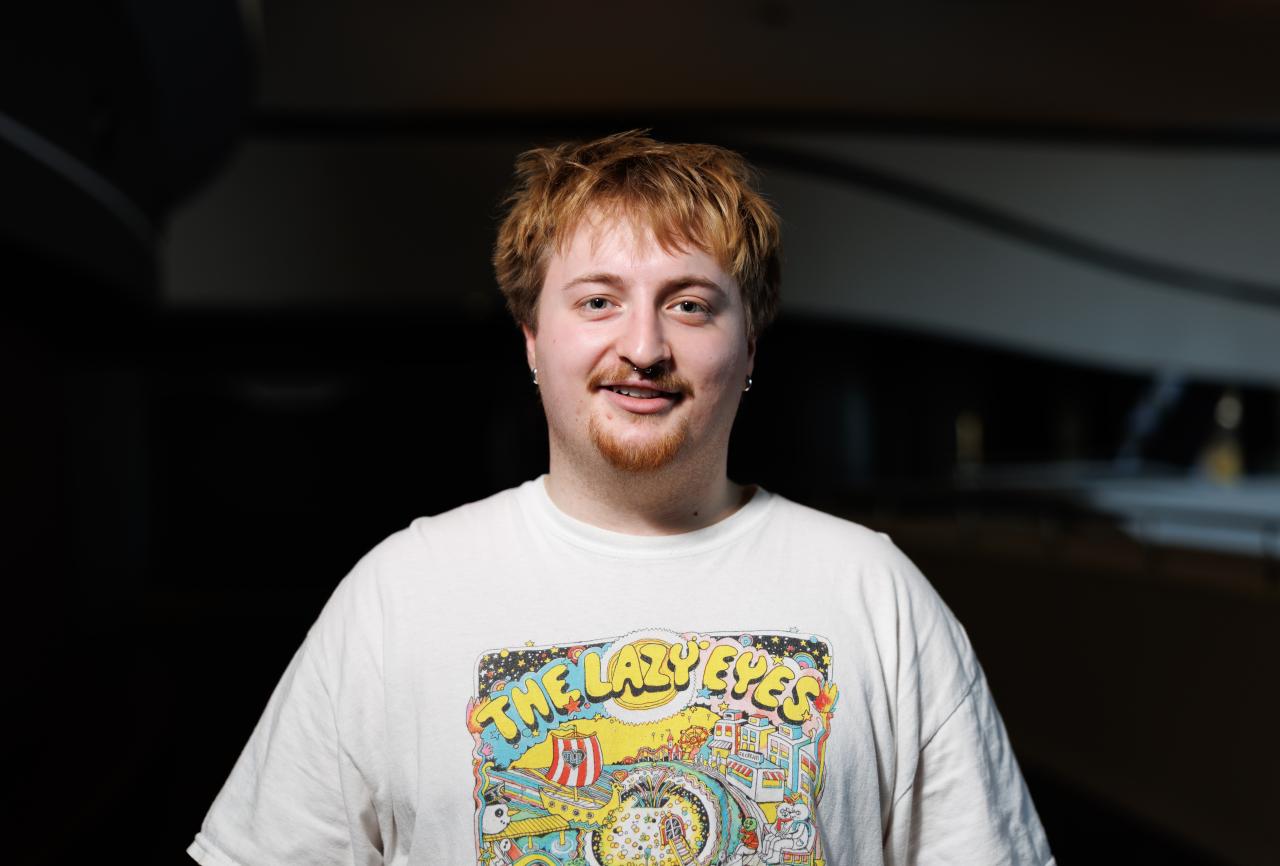 Young person wearing a white t-shirt