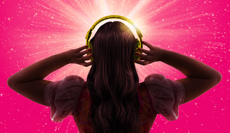 Silhouette of girl wearing headphones
