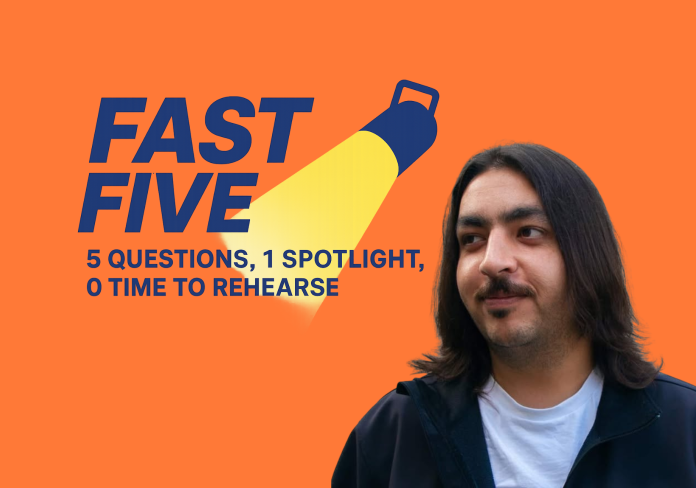 A headshot of a man with long hair beside the words Fast Five.