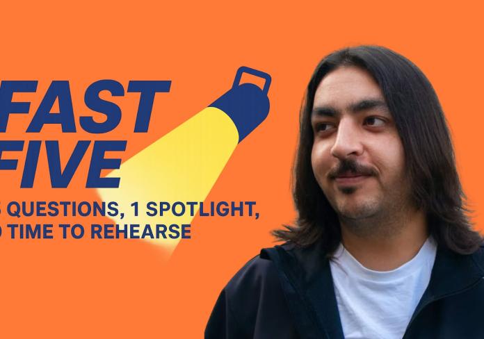 A headshot of a man with long hair beside the words Fast Five.