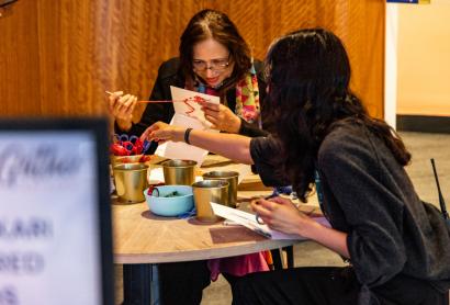 person doing embroidery